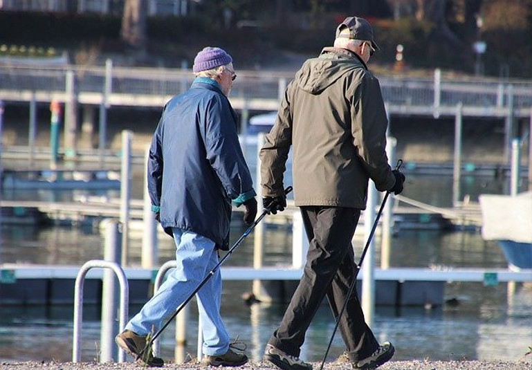 Two older men walking together, best exercise for seniors